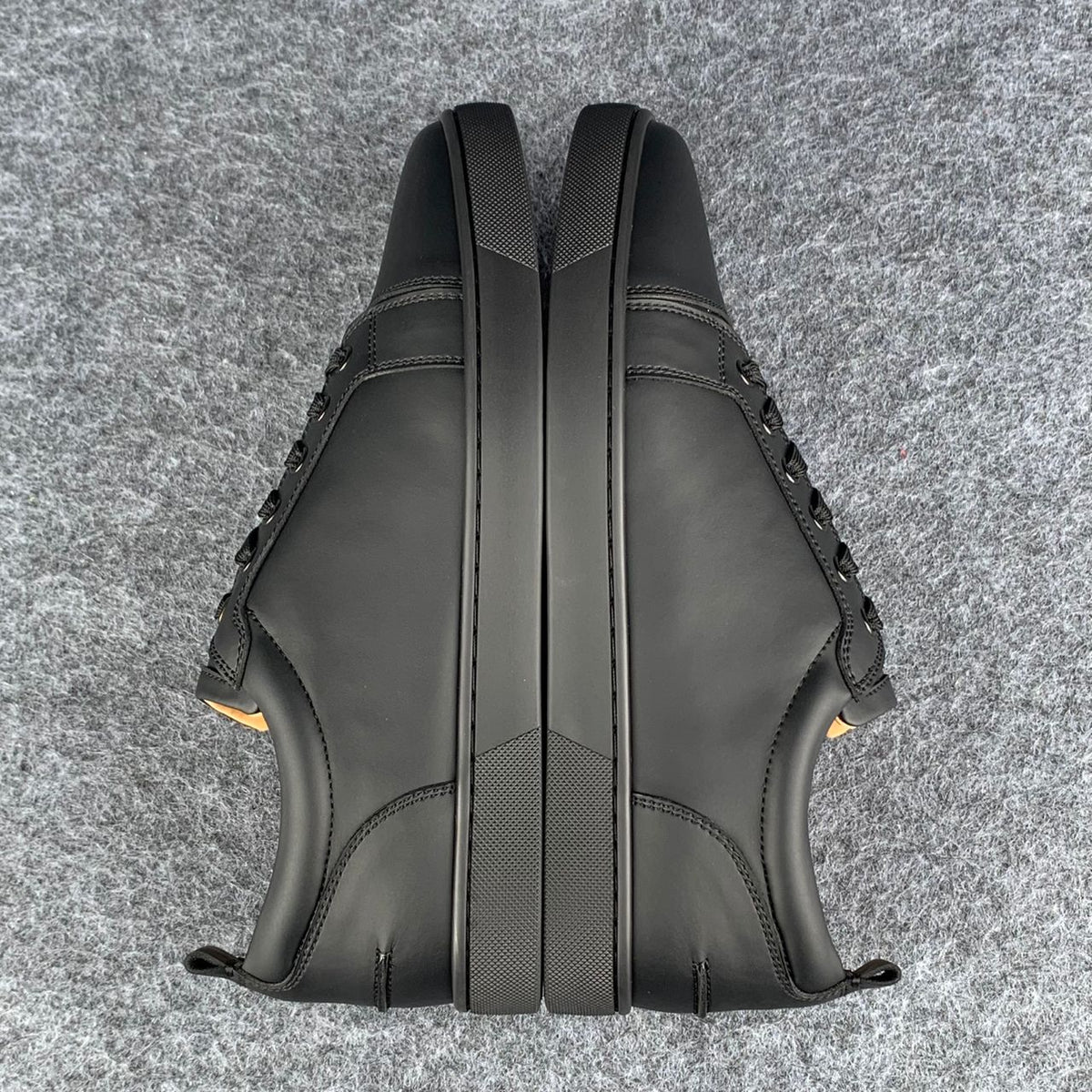 Christian Louboutin Louis Junior Low-Top Sneaker “Black Calfskin”